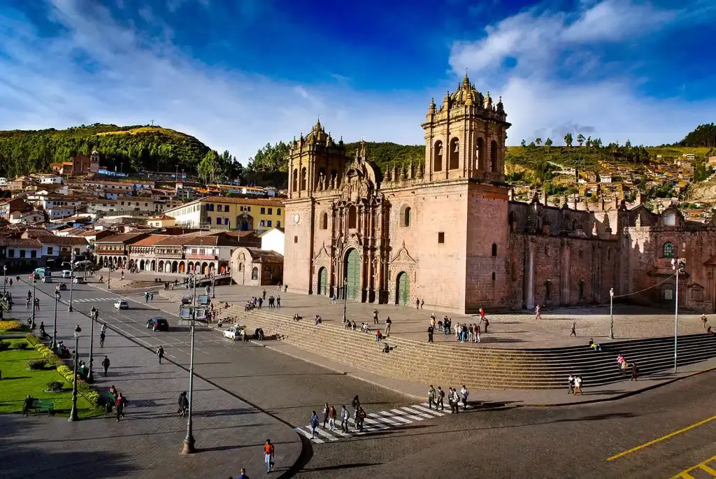 Plaza de Armas in Cusco with the cathedral and surrounding hills