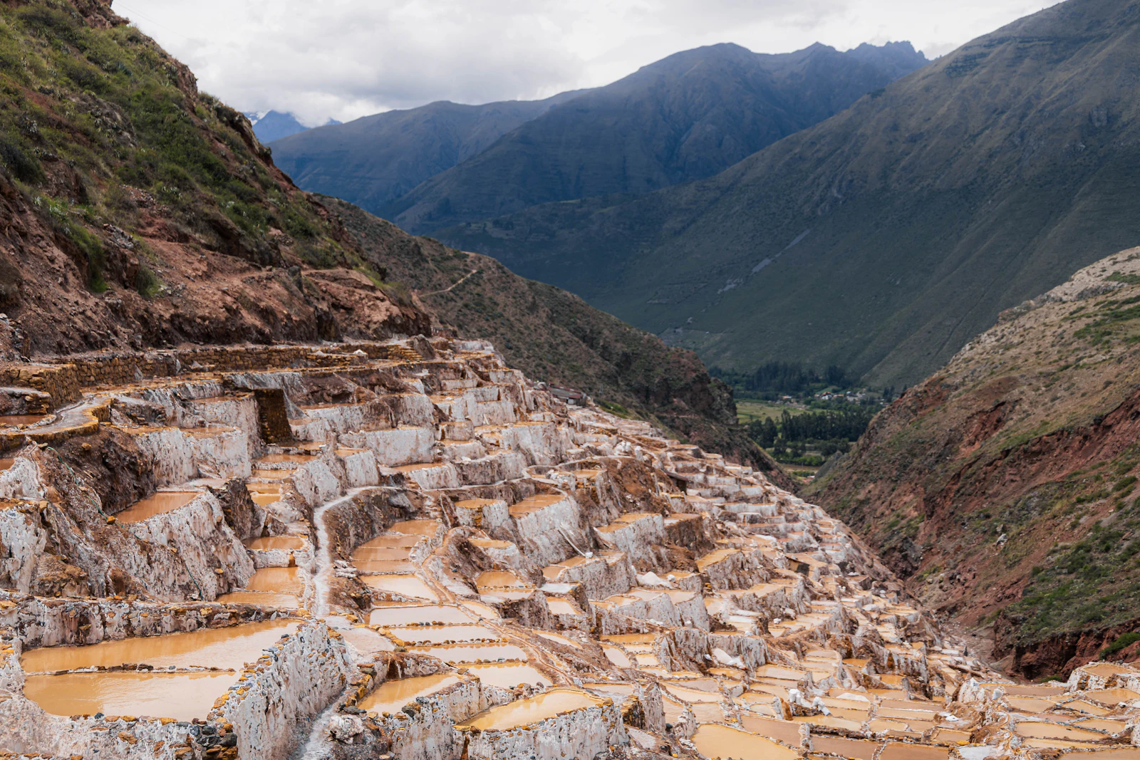 Terraced salt pans of Maras stepping down a hillside in the Sacred Valley