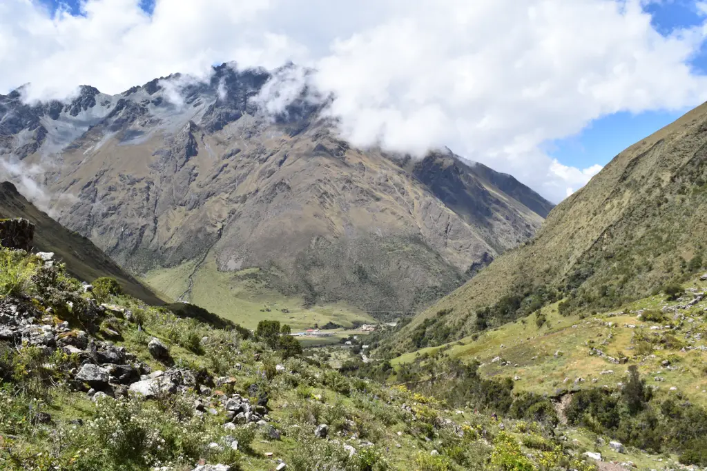 Green valley and rocky peaks seen from the trail to Humantay Lake above Soraypampa