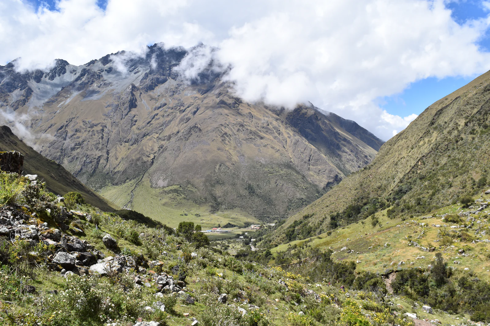 Green valley and rocky peaks seen from the trail to Humantay Lake above Soraypampa